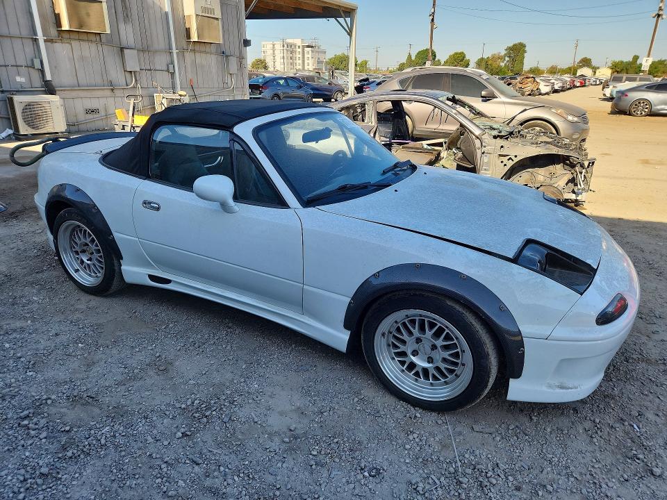 1997 Mazda Mx-5 miata VIN JM1NA3532V0725940 COPART salvage auction — REAR END, Ca - Salvage Certificate, sold $2,400 on 2026-07-27 (photo 4)