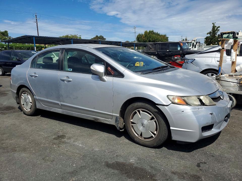2009 Honda Civic hybrid VIN JHMFA362X9S006440 COPART salvage auction — FRONT END, CA - DIS/DLR/EXP ONLY CLEAN TITLE, sold $1,100 on 2026-07-23 (photo 4)
