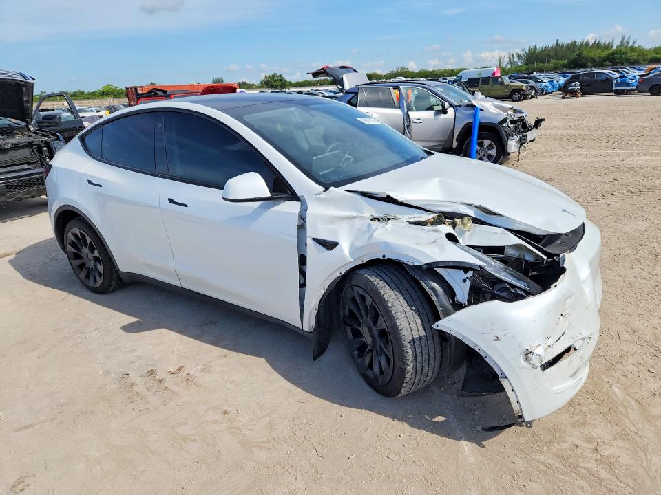 2023 Tesla Model y VIN 7SAYGDEE5PA092096 COPART salvage auction — FRONT END, Fl - Cert Of Title Slvg Rebuildable, sold $13,600 on 2026-07-15 (photo 4)