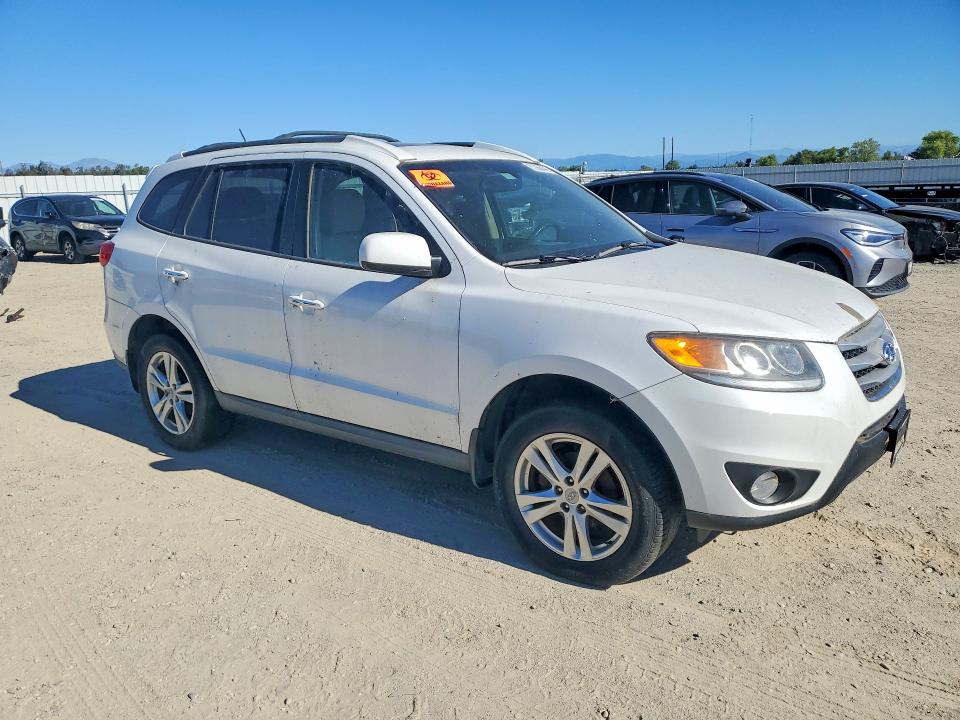 2012 Hyundai Santa fe VIN 5XYZKDAG2CG157564 COPART salvage auction — MINOR DENT/SCRATCHES, Ny - Dis/Dlr/Exp Clean Title, sold $750 on 2026-07-31 (photo 4)