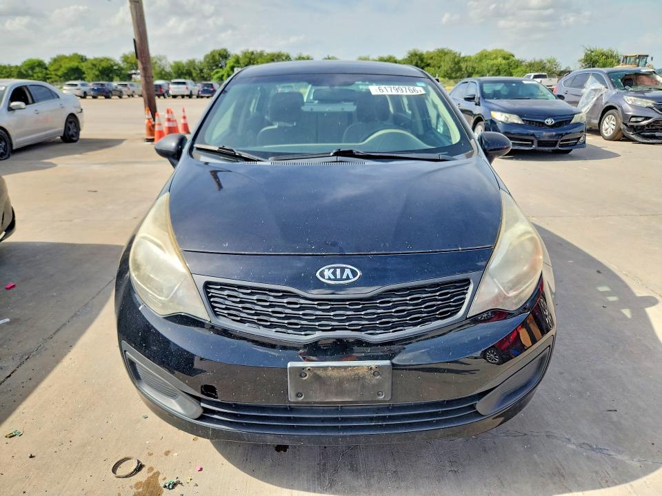 2015 Kia Rio VIN KNADM4A39F6527091 COPART salvage auction — NORMAL WEAR, Tx - Certificate Of Title, sold $975 on 2026-07-30 (photo 5)