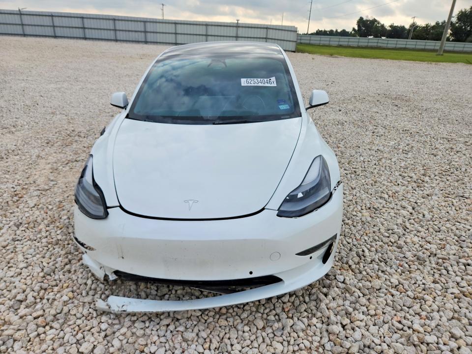 2022 Tesla Model 3 VIN 5YJ3E1EB3NF107275 COPART salvage auction — FRONT END, TX - SALVAGE VEHICLE TITLE, sold $7,100 on 2026-08-20 (photo 5)