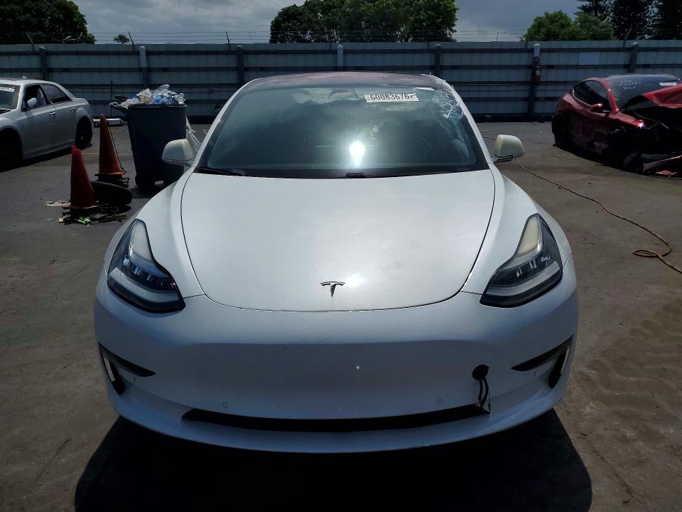 2018 Tesla Model 3 VIN 5YJ3E1EA7JF007505 COPART salvage auction — REAR END, Fl - Certificate Of Title, sold $4,450 on 2026-07-27 (photo 5)