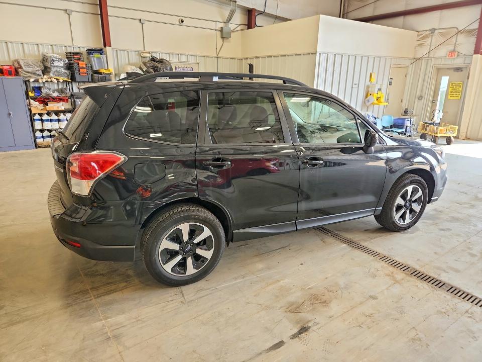 2018 Subaru Forester VIN JF2SJAEC0JH601007 COPART salvage auction — HAIL, WI - CERTIFICATE OF TITLE, sold $9,700 on 2026-09-15 (photo 3)