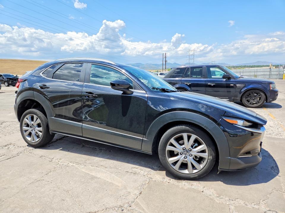2023 Mazda Cx-30 VIN 3MVDMBBM1PM524197 COPART salvage auction — SIDE, Co - Public - Salvage Title, sold $3,250 on 2026-09-02 (photo 4)