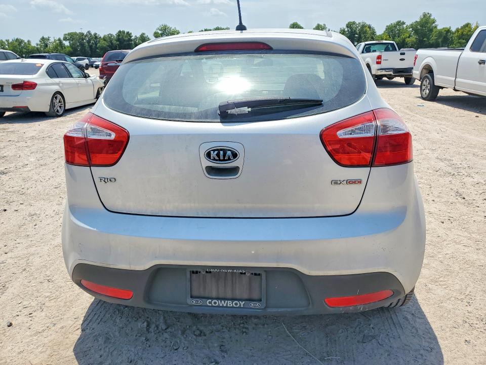 2012 Kia Rio VIN KNADN5A34C6024664 COPART salvage auction — NORMAL WEAR, Tx - Certificate Of Title, sold $250 on 2026-07-24 (photo 6)