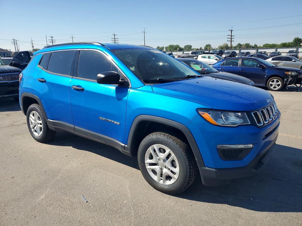 2021 Jeep Compass VIN 3C4NJDAB0MT567974 COPART salvage auction — HAIL, Id - Salvage Certificate Of Title, sold $4,700 on 2026-09-03 (photo 4)