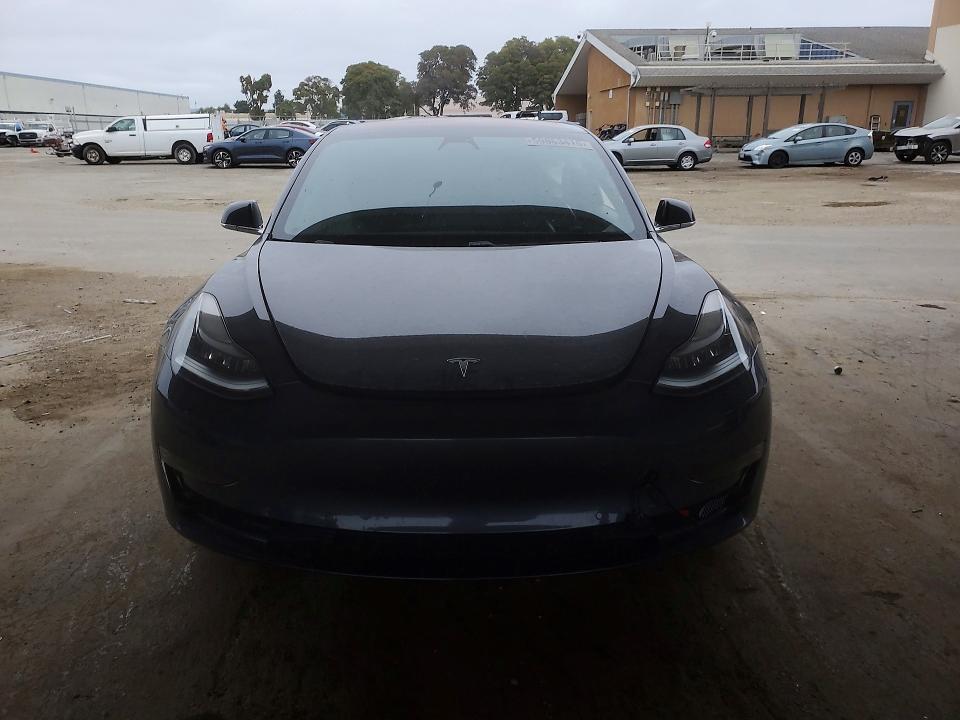 2018 Tesla VIN 5YJ3E1EB4JF129005 COPART salvage auction — SIDE, Ca - Salvage Certificate, sold $4,550 on 2026-07-19 (photo 5)