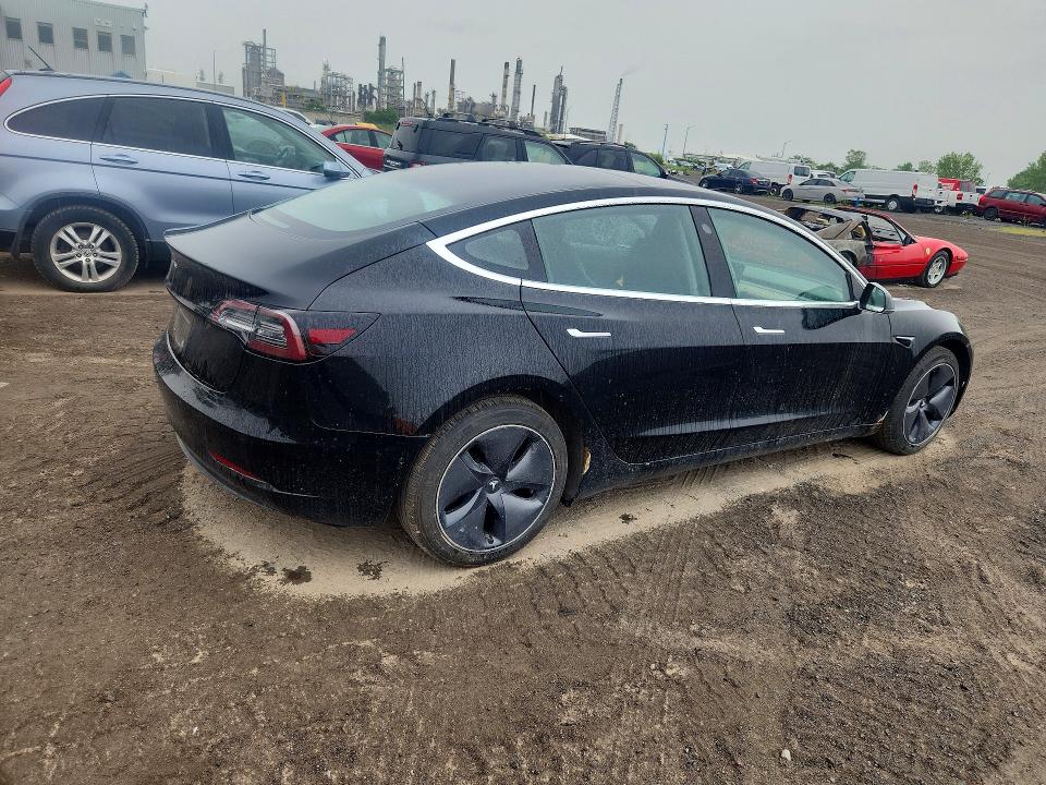 2018 Tesla Model 3 VIN 5YJ3E1EA7JF095617 COPART salvage auction — MINOR DENT/SCRATCHES, Qc - Aucune Mention, sold $9,300 on 2026-07-29 (photo 3)