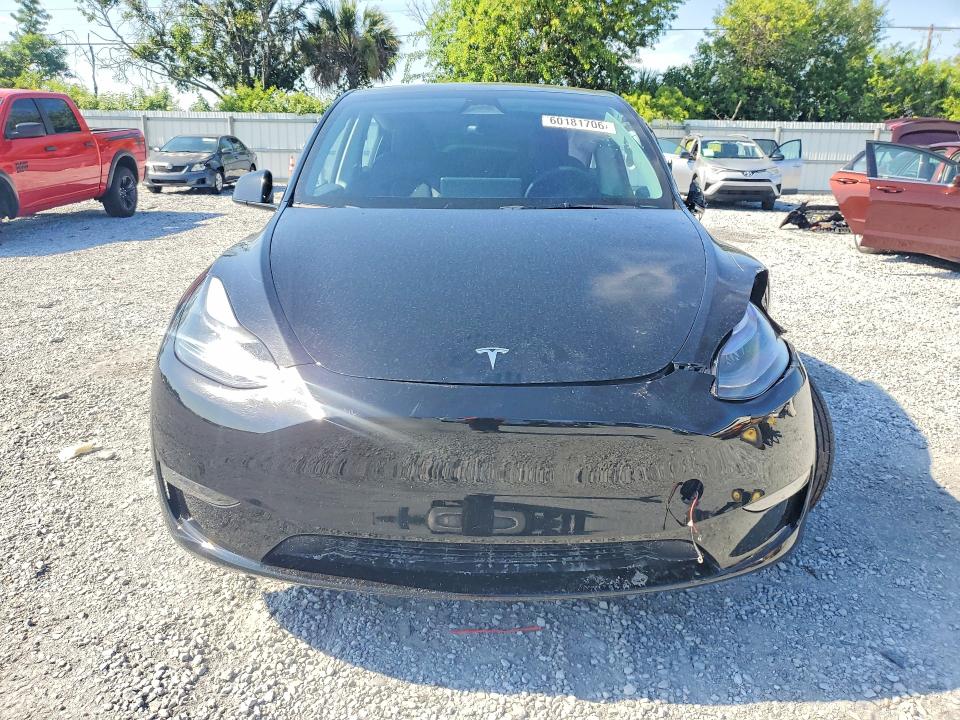 2023 Tesla Model y VIN 7SAYGDEF6PF844075 COPART salvage auction — SIDE, Fl - Cert Of Title Slvg Rebuildable, sold $9,700 on 2026-07-31 (photo 5)