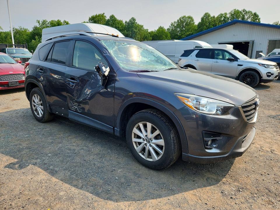 2016 Mazda Cx-5 VIN JM3KE4CY4G0871956 COPART salvage auction — SIDE, Ct - Cert Of Title-Salvage, sold $2,700 on 2026-07-23 (photo 4)
