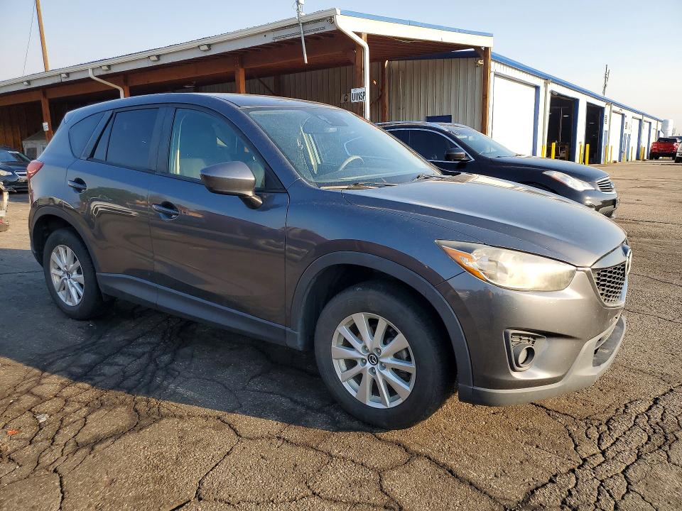 2014 Mazda Cx-5 VIN JM3KE4CY0E0376232 COPART salvage auction — MECHANICAL, Co - Dis/Dlr/Exp Only Clean Title, sold $325 on 2026-07-28 (photo 4)