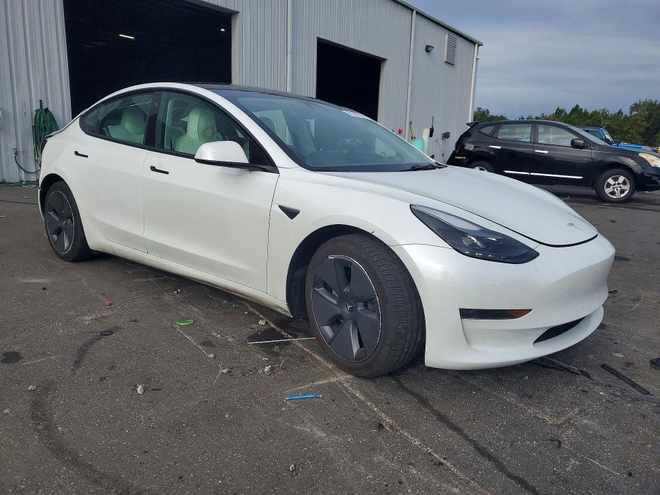 2023 Tesla Model 3 VIN 5YJ3E1EA3PF466653 COPART salvage auction — REAR END, Salvage Title, sold $8,100 on 2026-07-20 (photo 4)