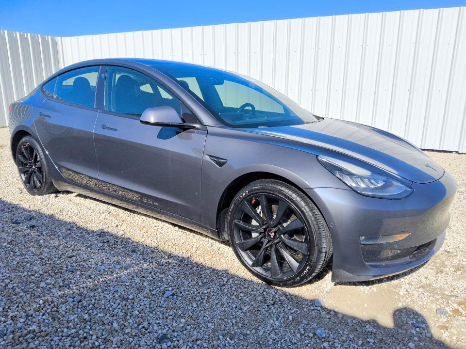 2018 Tesla Model 3 VIN 5YJ3E1EB7JF185035 COPART salvage auction — NORMAL WEAR, Fl - Certificate Of Title, sold $10,900 on 2026-07-28 (photo 4)