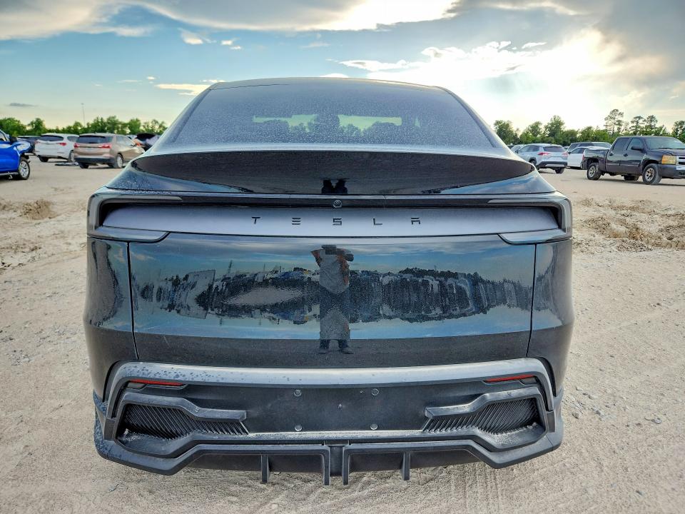 2026 Tesla Model y VIN 7SAYGDED8TA454679 COPART salvage auction — NORMAL WEAR, TX - SALVAGE VEHICLE TITLE, sold $10,000 on 2026-07-24 (photo 6)