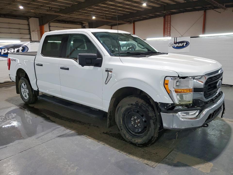 2021 Ford F-150 lightning VIN 1FTFW1E86MFC10845 COPART salvage auction — MINOR DENT/SCRATCHES, AB - BOS - ACTIVE, sold $9,100 on 2026-07-29 (photo 4)