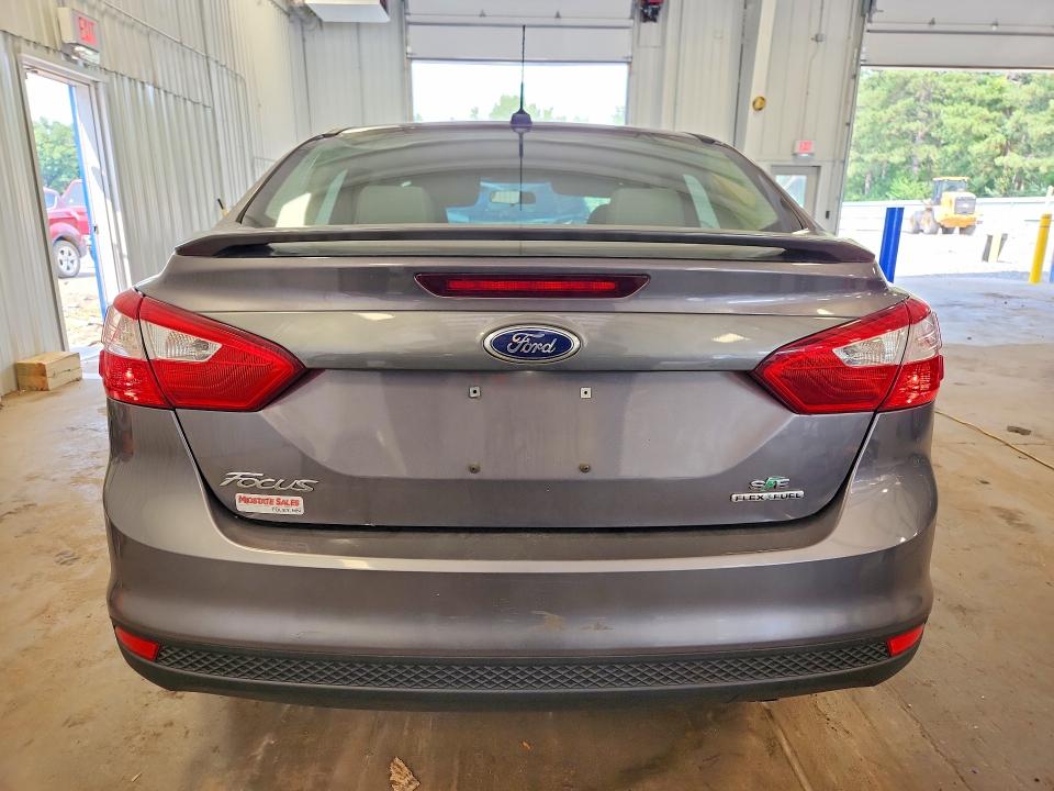 2014 Ford Focus VIN 1FADP3F22EL383300 COPART salvage auction — MINOR DENT/SCRATCHES, Mn - Non Public Clean Title, sold $650 on 2026-08-01 (photo 6)