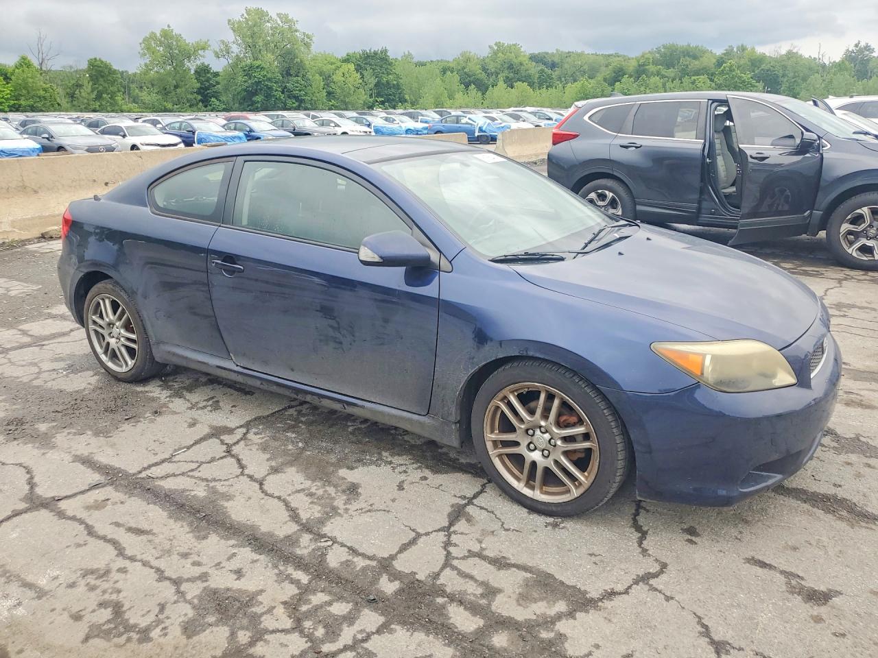 2007 Scion Tc VIN JTKDE177770207984 COPART salvage auction — Side, AZ - CERT OF TITLE - SALVAGE, sold $975 on 2026-09-14 (photo 4)
