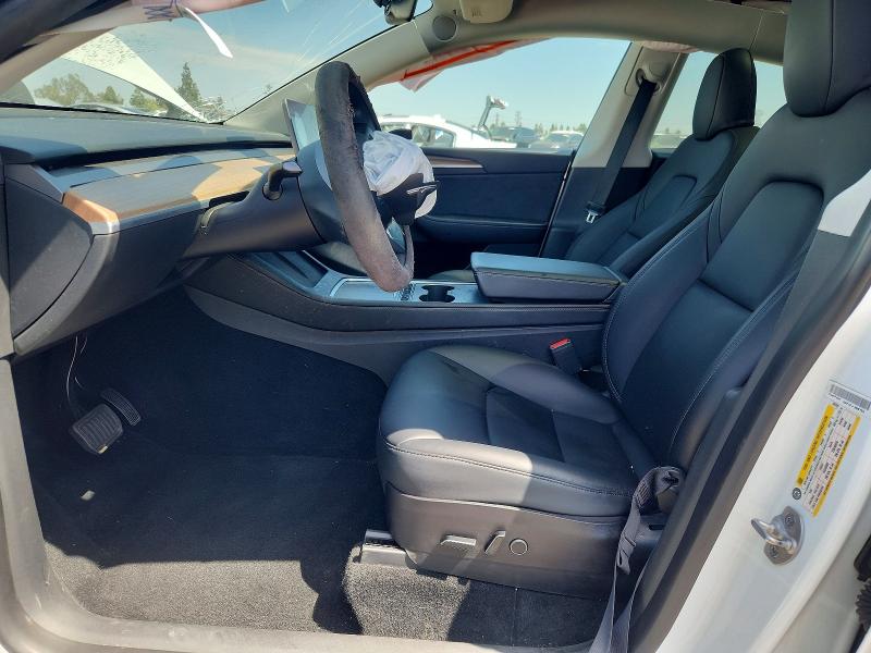 2023 Tesla Model y VIN 7SAYGAEE6PF697231 COPART salvage auction — FRONT END, Ca - Salvage Certificate, sold $9,100 on 2026-10-08 (photo 7)