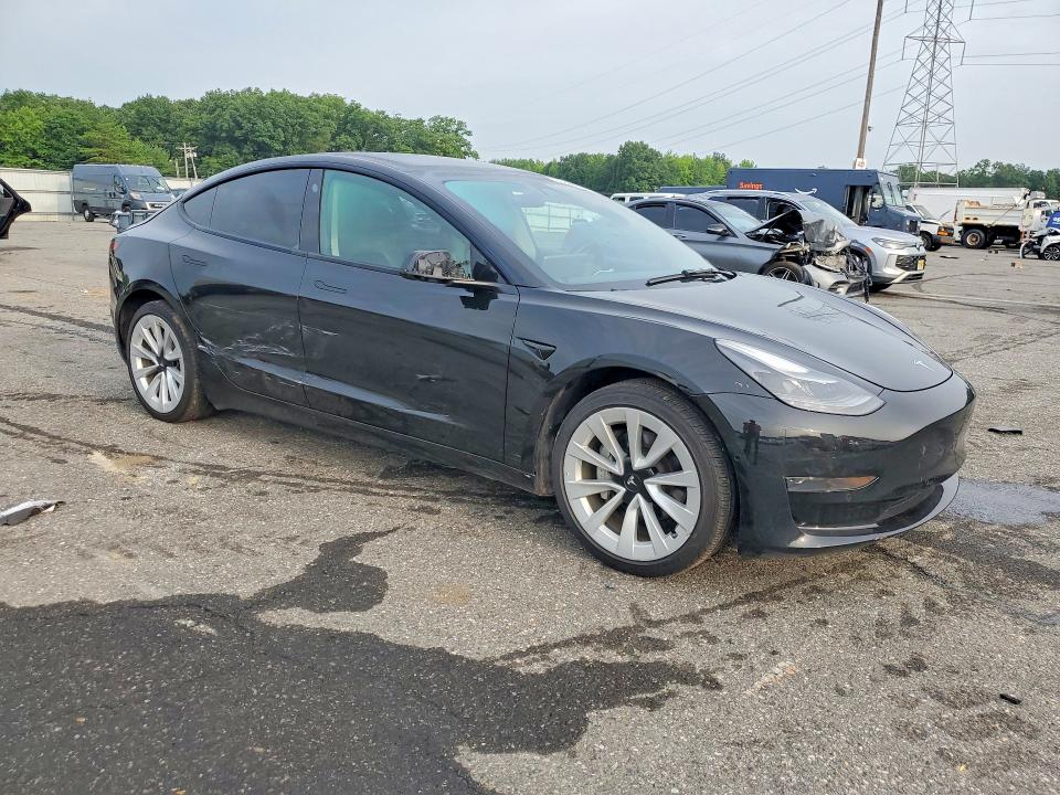 2022 Tesla Model 3 VIN 5YJ3E1EA7NF369033 COPART salvage auction — SIDE, PA - CERT OF TITLE, sold $11,700 on 2026-07-22 (photo 4)