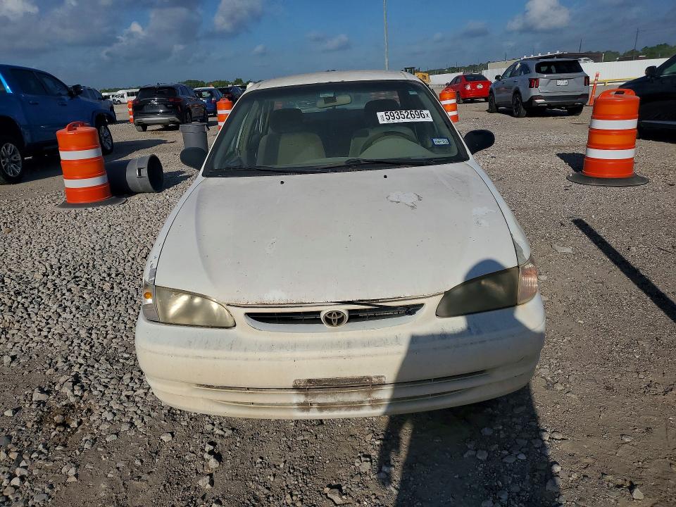 1999 Toyota Corolla VIN 1NXBR12EXXZ288797 COPART salvage auction — MINOR DENT/SCRATCHES, Tx - Certificate Of Title, sold $250 on 2026-07-09 (photo 5)