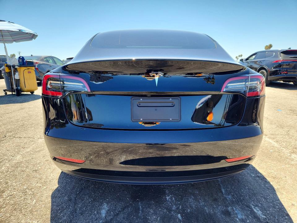 2023 Tesla Model 3 VIN 5YJ3E1EA7PF698947 COPART salvage auction — NORMAL WEAR, Ca - Salvage Certificate (P), sold $13,700 on 2026-07-24 (photo 6)
