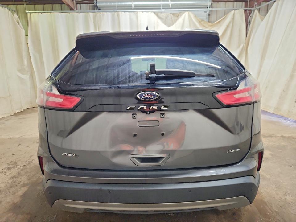 2021 Ford Edge VIN 2FMPK4J90MBA54167 COPART salvage auction — MINOR DENT/SCRATCHES, La - Certificate Of Title, sold $8,300 on 2026-07-28 (photo 6)