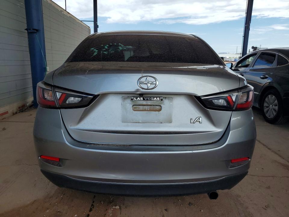 2016 Scion Ia VIN 3MYDLBZV0GY124581 COPART salvage auction — FRONT END, AZ - CERT OF TITLE - SALVAGE, sold $250 on 2026-07-21 (photo 6)