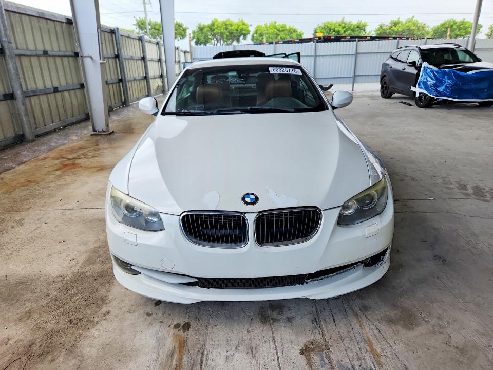 2012 BMW 3 series VIN WBADW7C5XCE730048 COPART salvage auction — MINOR DENT/SCRATCHES, FL - CERT OF TTL-REBUILT&SLVG RBLD, sold $825 on 2026-07-29 (photo 5)