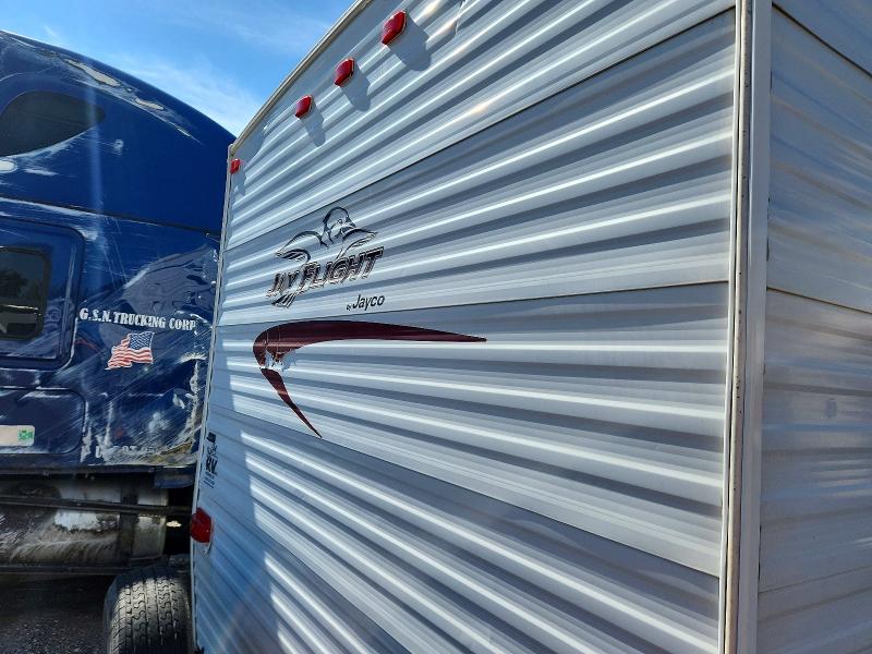 2005 Jay Jay flight VIN 1UJBJ02N651EF2596 COPART salvage auction — HAIL, MT - CERTIFICATE OF TITLE TOTALED, sold $1,400 on 2026-09-08 (photo 9)