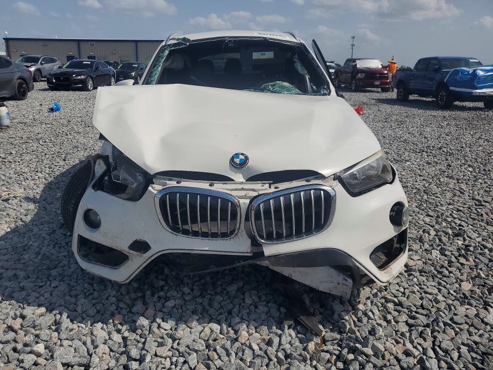 2017 BMW X1 VIN WBXHT3C36H5F73989 COPART salvage auction — ROLLOVER, FL - CERT OF TITLE SLVG REBUILDABLE, sold $750 on 2026-07-31 (photo 5)