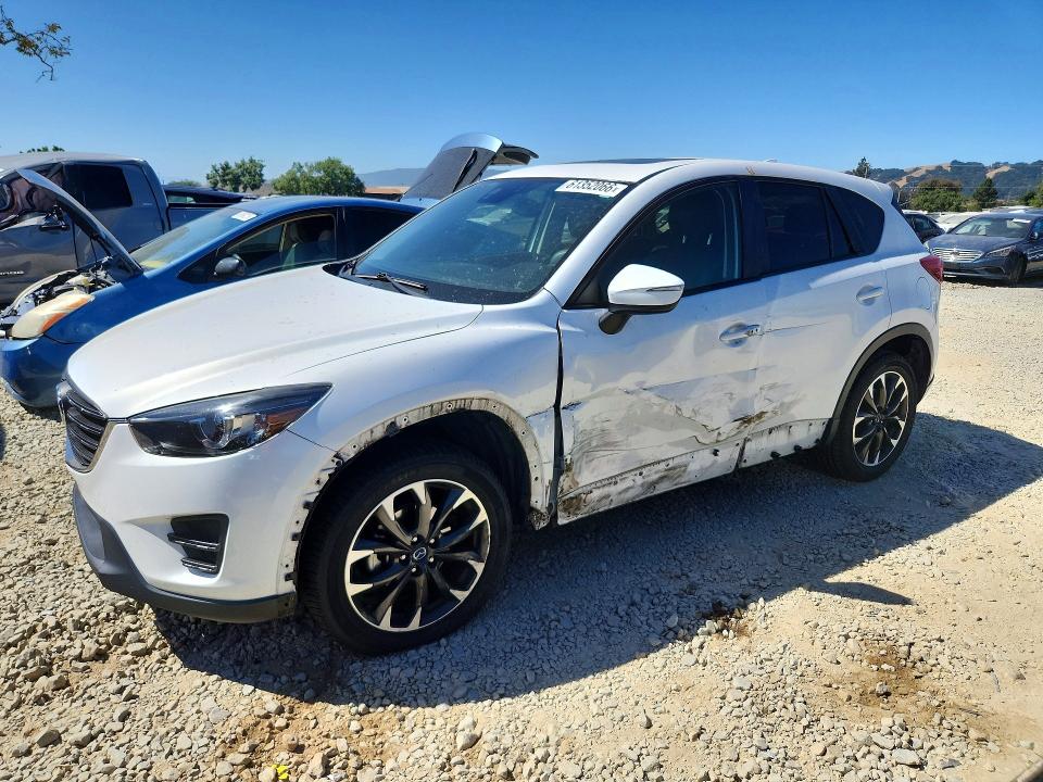 2016 Mazda Cx-5 VIN JM3KE2DY8G0872224 COPART salvage auction — SIDE, Ca - Salvage Certificate, sold $825 on 2026-07-23 (photo 1)