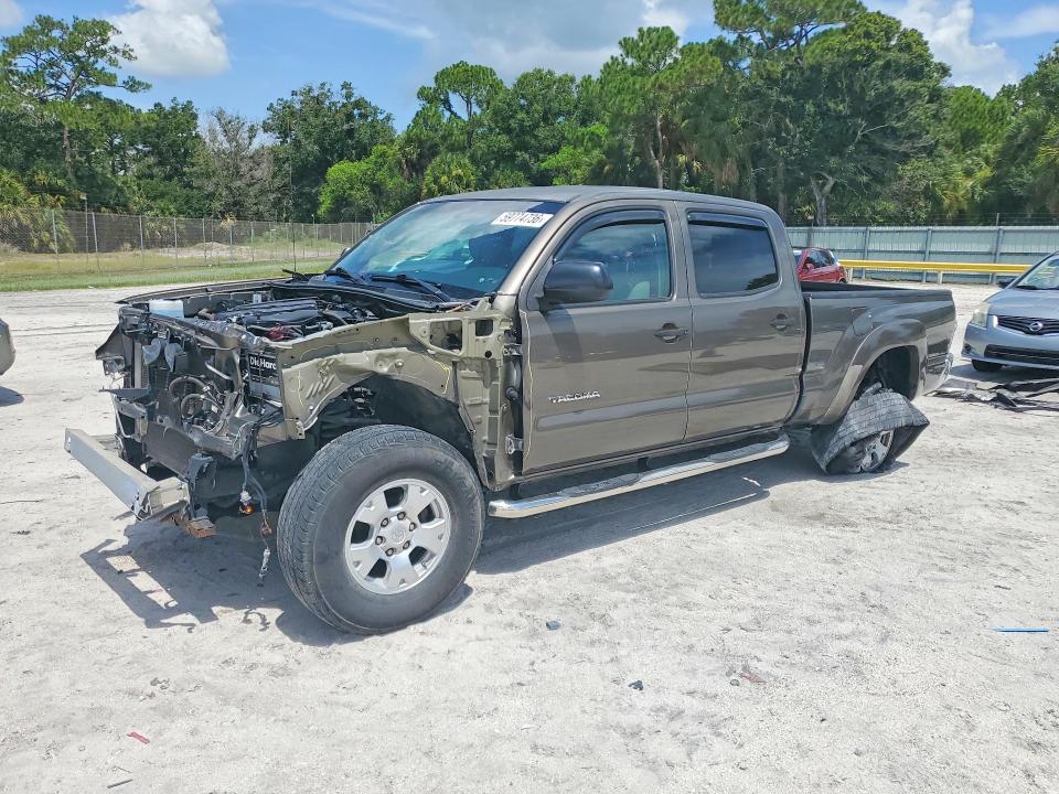 2014 Toyota Tacoma VIN 5TFKU4HNXEX005337 COPART salvage auction — FRONT END, Fl - Cert Of Title Slvg Rebuildable, sold $100 on 2026-07-29 (photo 1)