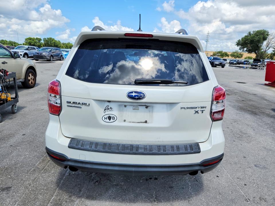 2014 Subaru Forester VIN JF2SJGMC5EH501950 COPART salvage auction — FRONT END, Fl - Cert Of Title Slvg Rebuildable, sold $1,000 on 2026-07-14 (photo 6)
