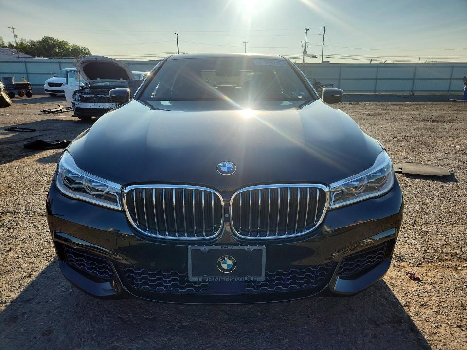 2016 BMW 7er VIN WBA7F2C55GG420299 COPART salvage auction — UNDERCARRIAGE, Pa - Certificate Of Salvage, sold $225 on 2026-07-28 (photo 5)