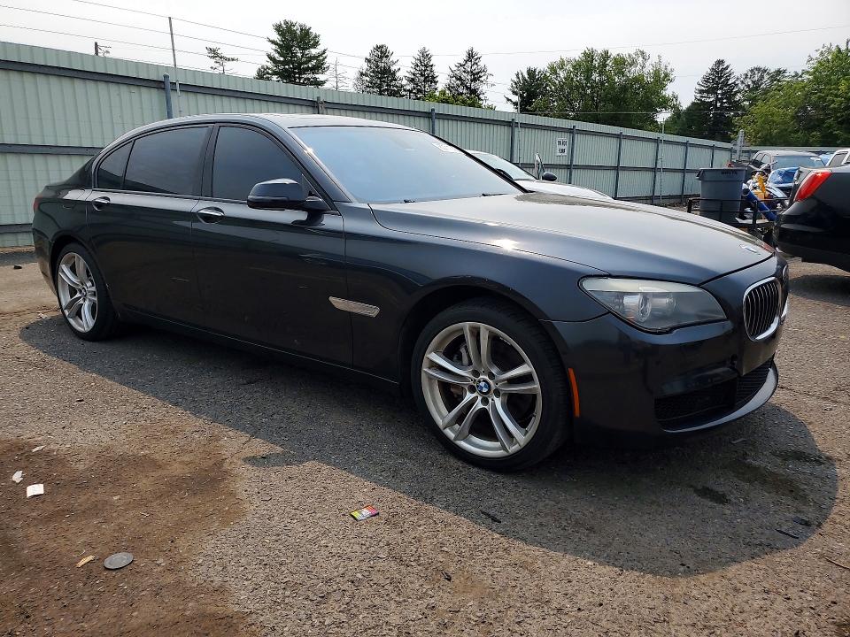 2013 BMW 7er VIN WBAYE4C58DD136987 COPART salvage auction — MINOR DENT/SCRATCHES, Fl - Cert Of Title Slvg Rebuildable, sold $2,950 on 2026-07-24 (photo 4)