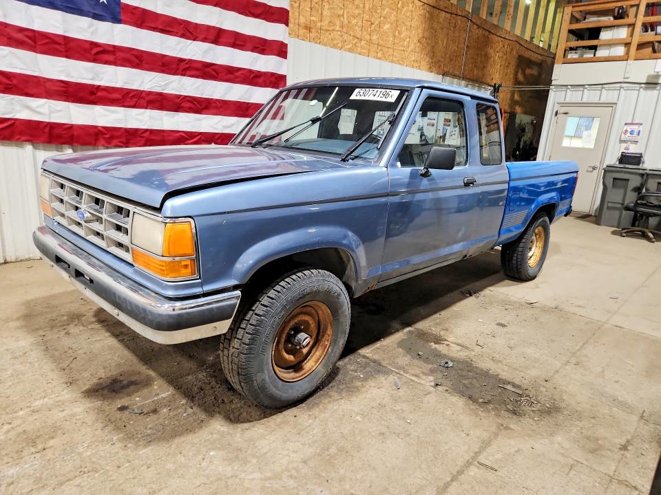 1989 Ford Ranger VIN 1FTCR15T2KPA32065 COPART salvage auction — MINOR DENT/SCRATCHES, Ak - Cert Of Veh Title-Reconstructe, sold $450 on 2026-08-04 (photo 1)