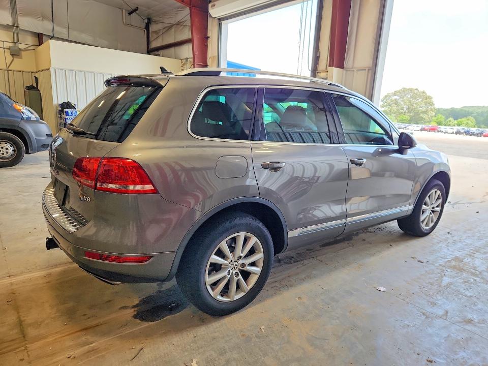 2014 Volkswagen Touareg VIN WVGEF9BP9ED004241 COPART salvage auction — HAIL, Wi - Certificate Of Title, sold $200 on 2026-07-28 (photo 3)