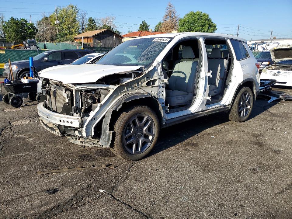 2023 Honda Passport VIN 5FNYF8H57PB033606 — COPART salvage auction photo