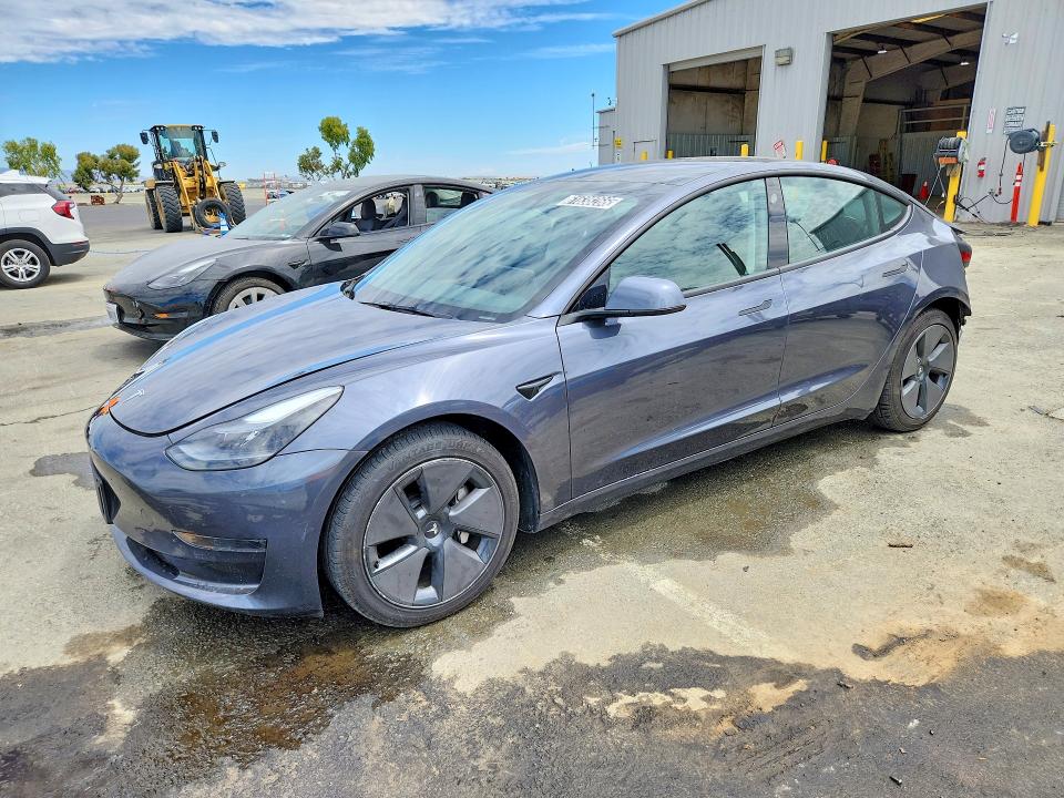 2023 Tesla Model 3 VIN 5YJ3E1EA4PF687985 — COPART salvage auction photo