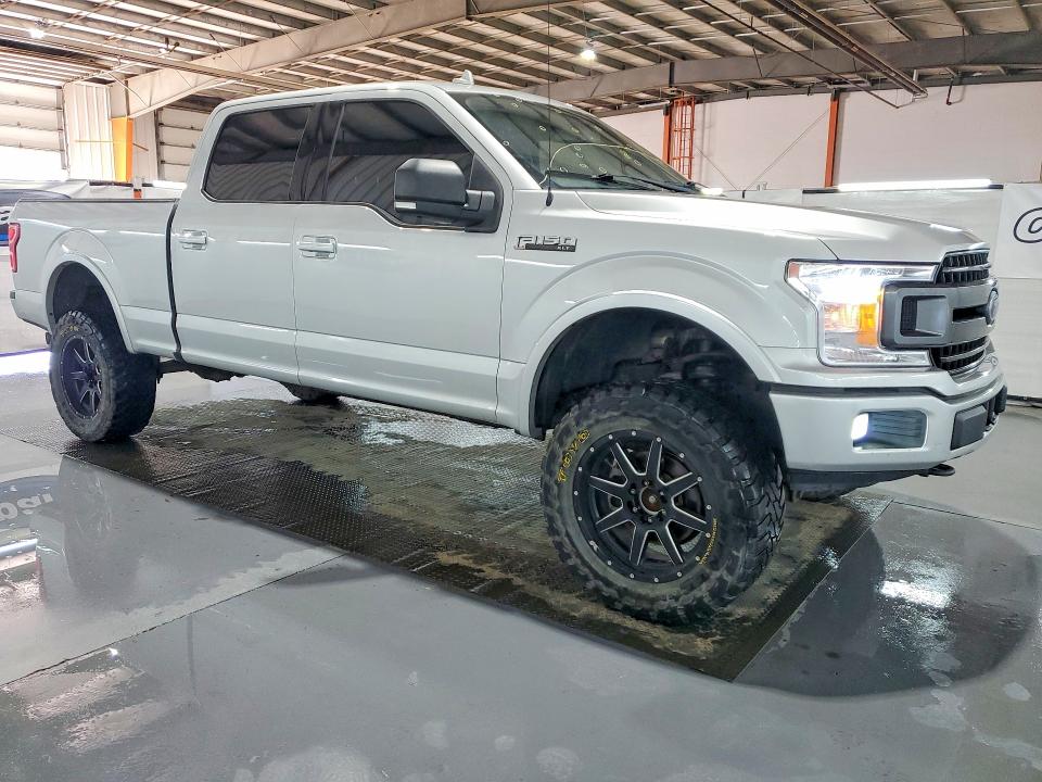 2018 Ford F-150 lightning VIN 1FTFW1E5XJKE89628 COPART salvage auction — NORMAL WEAR, AB - BOS - ACTIVE, sold $10,100 on 2026-07-29 (photo 4)