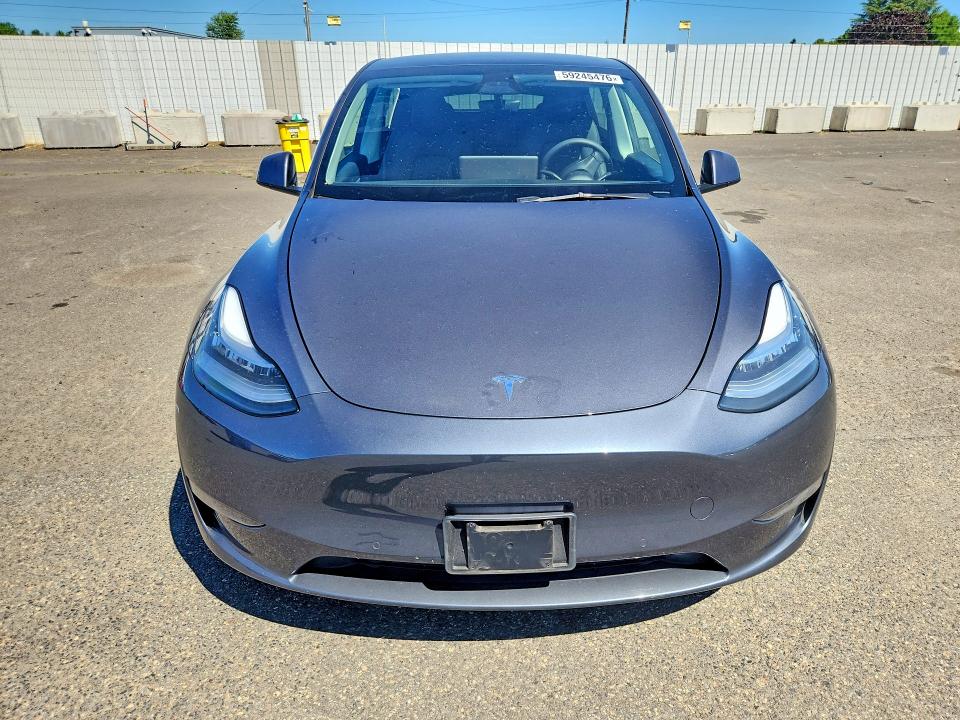 2021 Tesla Model y VIN 5YJYGDEE3MF229998 COPART salvage auction — SIDE, OR - SALVAGE TITLE CERTIFICATE, sold $125 on 2026-09-07 (photo 5)