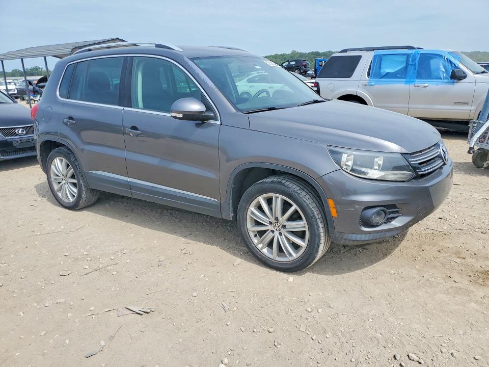 2012 Volkswagen Tiguan VIN WVGAV7AXXCW004158 COPART salvage auction — SIDE, Ks - Cert Of Title-Salvage, sold $1,100 on 2026-08-11 (photo 4)
