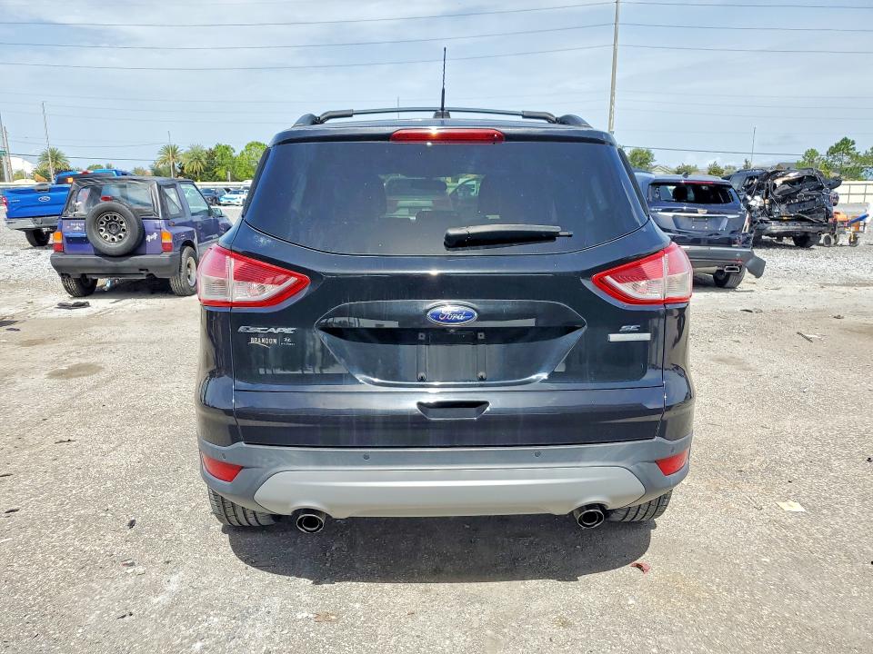 2016 Ford Escape VIN 1FMCU0GX5GUC20236 COPART salvage auction — SIDE, Fl - Cert Of Title Slvg Rebuildable, sold $850 on 2026-07-31 (photo 6)
