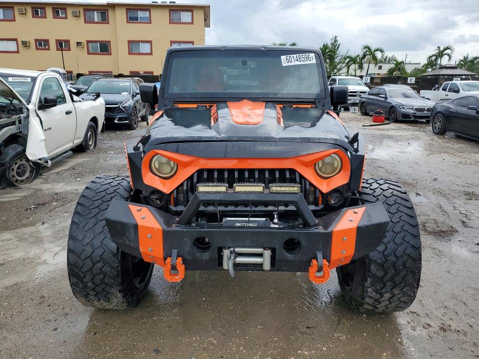 2013 Jeep Wrangler / VIN 1C4BJWDG3DL521444 COPART salvage auction — FRONT END, Fl - Cert Of Title-Rebuilt, sold $4,300 on 2026-07-10 (photo 5)