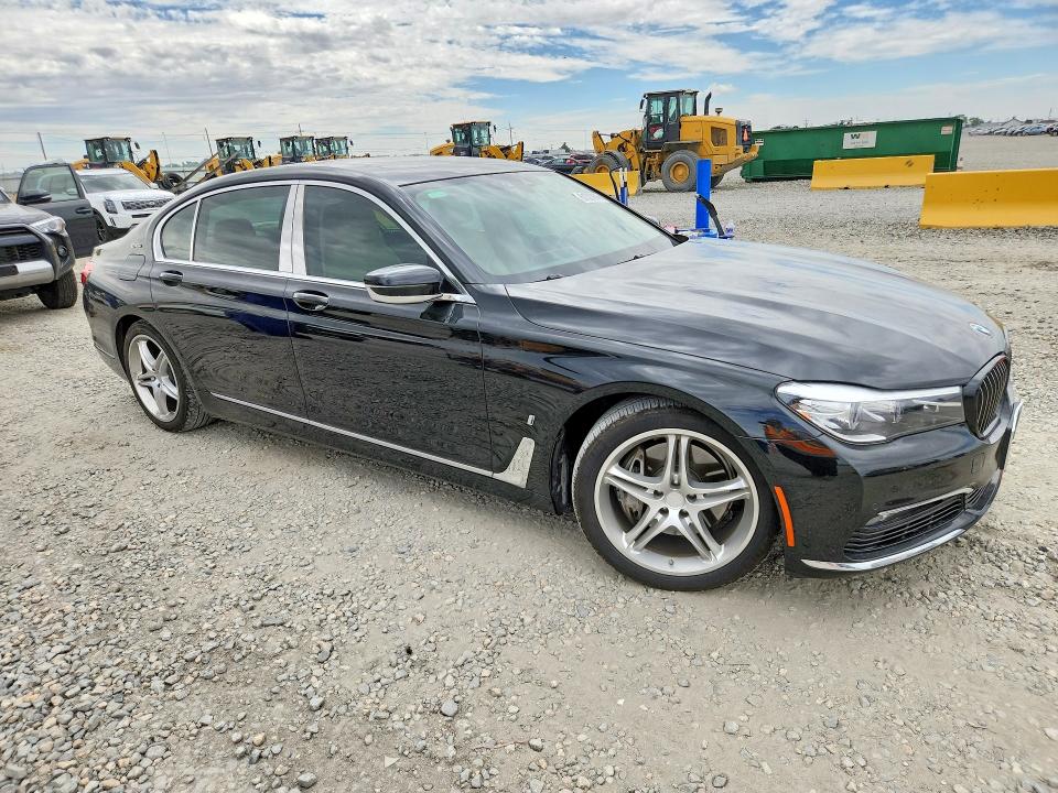 2018 BMW 7er VIN WBA7J2C52JG938408 COPART salvage auction — HAIL, Co - Certificate Of Title, sold $12,000 on 2026-08-13 (photo 4)