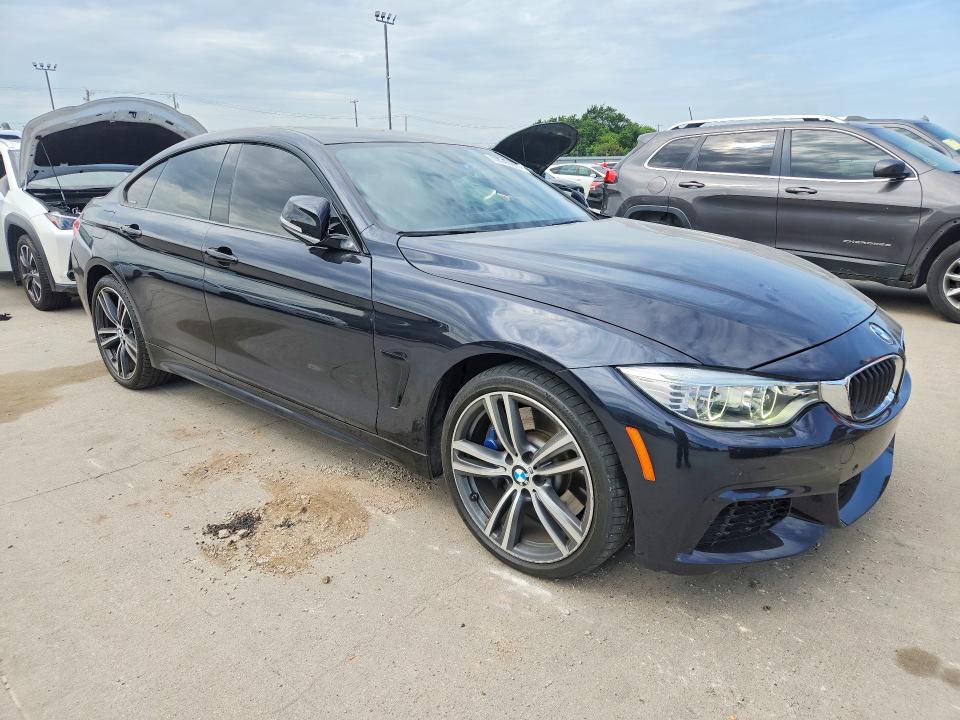 2015 BMW VIN WBA4B3C57FD670258 COPART salvage auction — MINOR DENT/SCRATCHES, Tx - Certificate Of Title, sold $5,300 on 2026-07-16 (photo 4)