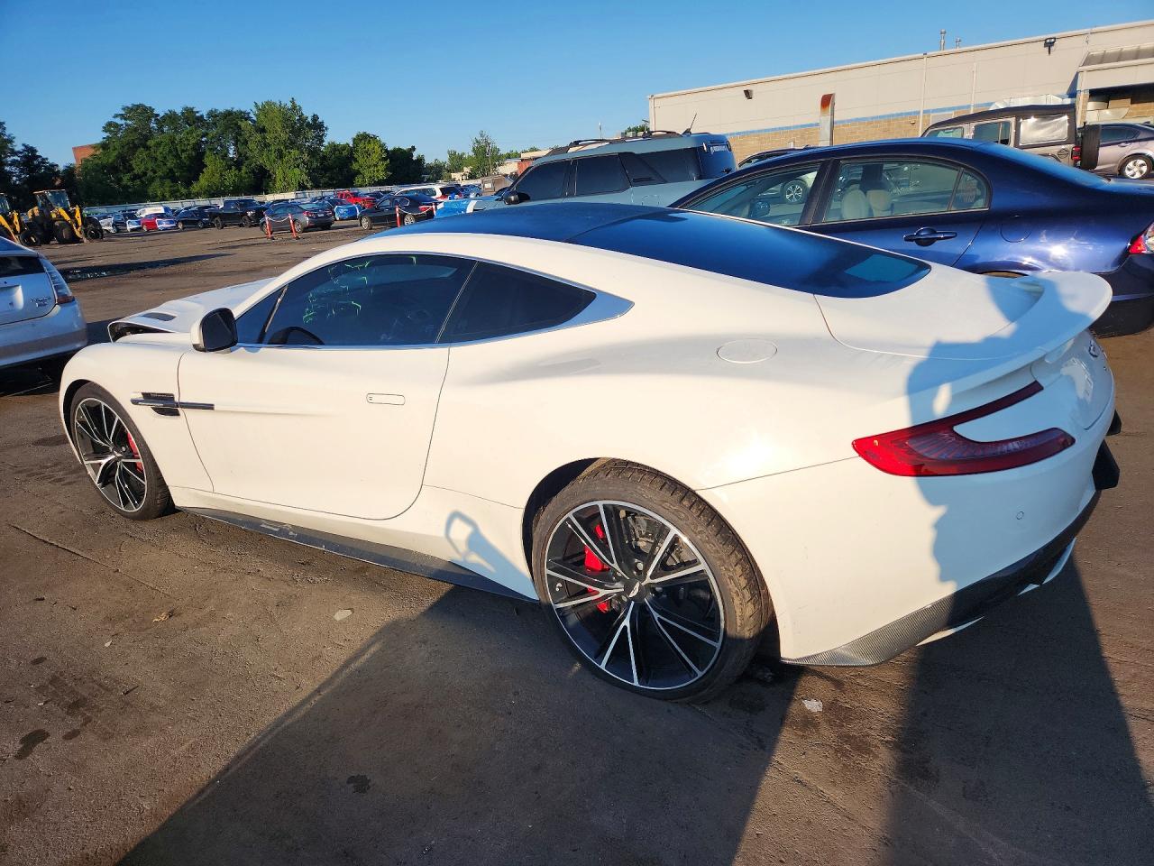 2014 Aston Martin V12 Vanquish VIN SCFLDCFP2EGJ00902 COPART salvage auction — Front End, St - Salvage Title, sold $31,750 on 2026-09-25 (photo 2)