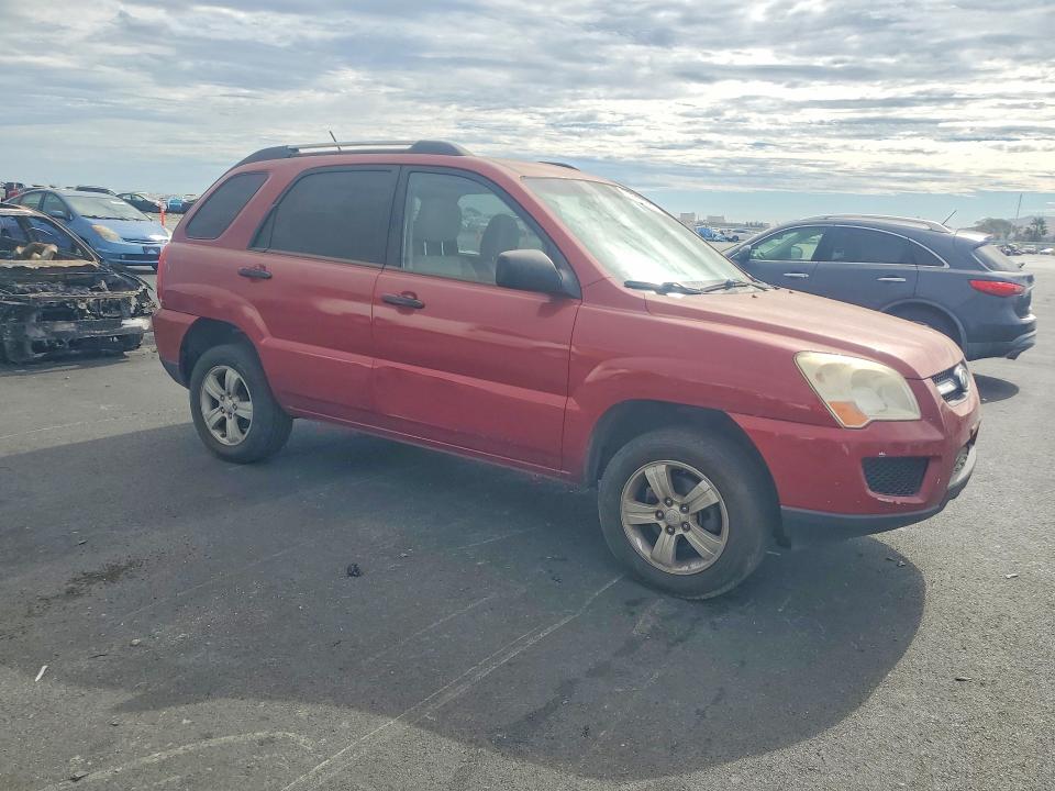 2009 Kia Sportage VIN KNDJF724X97558048 COPART salvage auction — MINOR DENT/SCRATCHES, Ca - Dis/Dlr/Exp Only Clean Title, sold $275 on 2026-07-29 (photo 4)