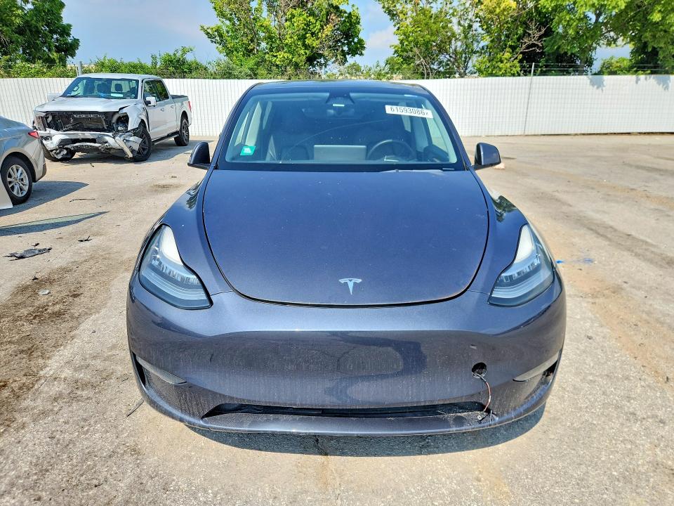 2023 Tesla Model y VIN 7SAYGDEF5PA049323 COPART salvage auction — NORMAL WEAR, MO - CERTIFICATE OF TITLE, sold $9,000 on 2026-07-28 (photo 5)